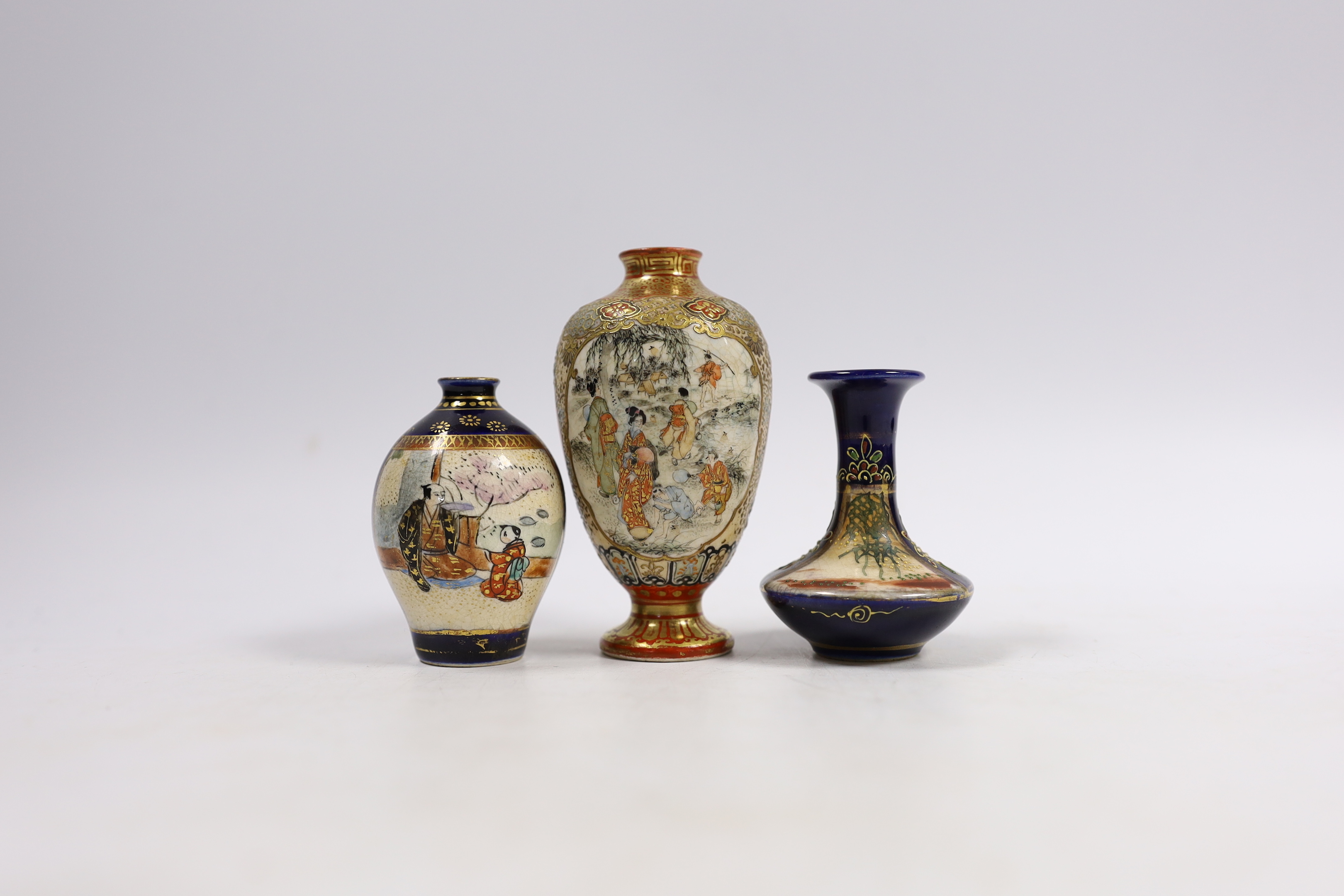 A Japanese miniature Kutani vase and two Satsuma examples, largest 9cm high